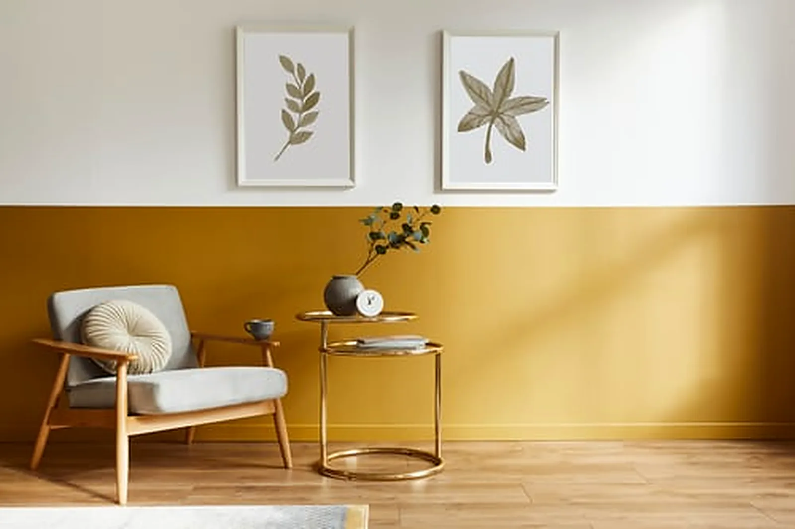 Mid-century chair against a two-tone mustard and white accent wall showing a crisp interior paint job